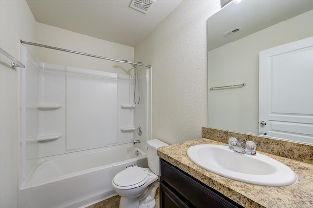 full bathroom with vanity, toilet, and  shower combination