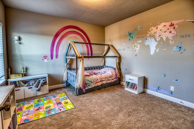 bedroom featuring carpet floors and a textured ceiling