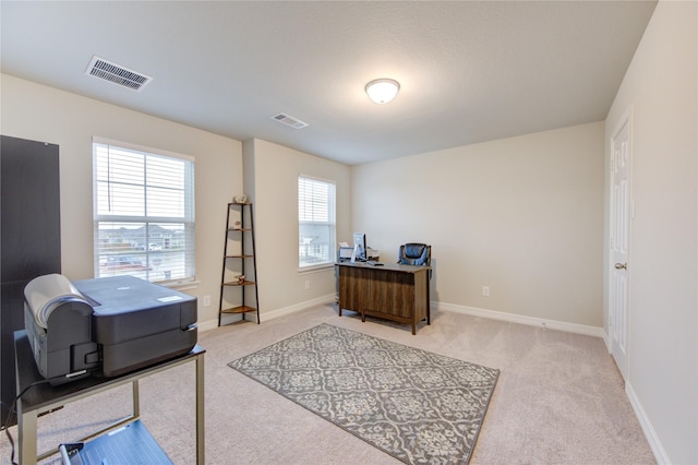 view of carpeted office space