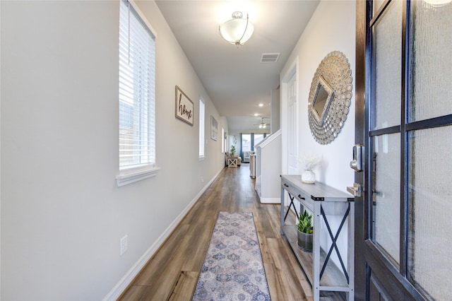 hall featuring hardwood / wood-style flooring