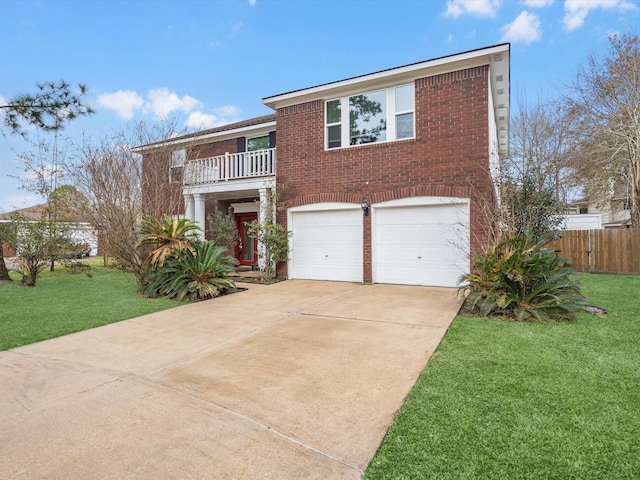 view of front of home featuring a garage, a balcony, and a front yard