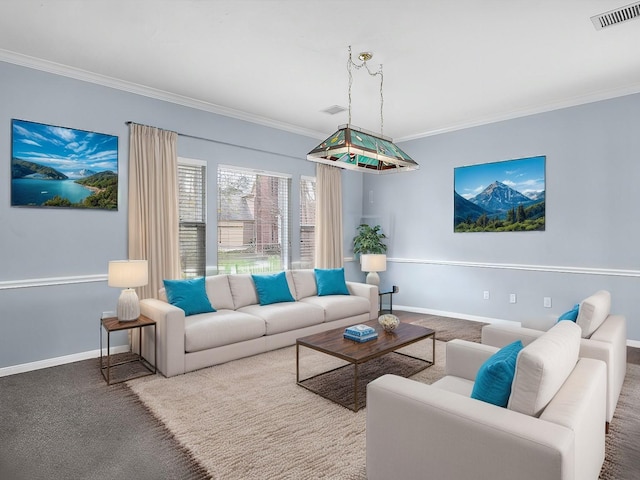 living area with baseboards, visible vents, and crown molding