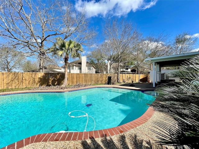 view of pool featuring a fenced backyard and a fenced in pool