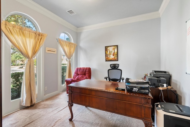 home office with ornamental molding and light carpet