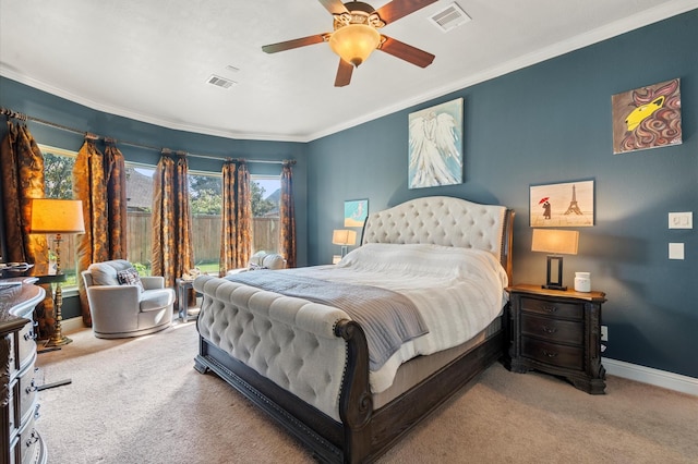 carpeted bedroom with access to exterior, crown molding, and ceiling fan