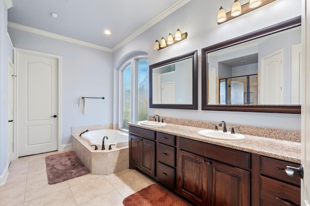 bathroom featuring vanity, ornamental molding, tile patterned floors, and independent shower and bath