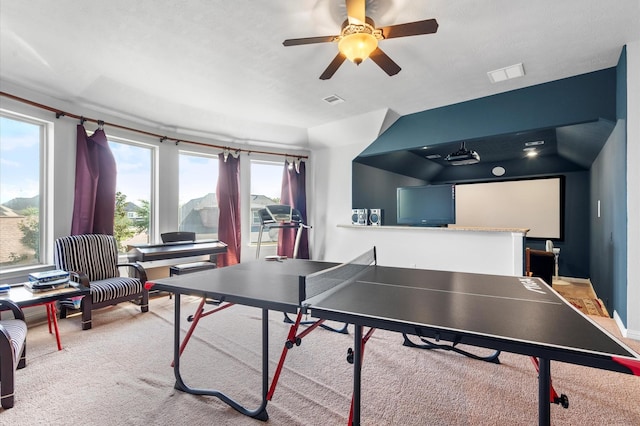 game room featuring light carpet and ceiling fan