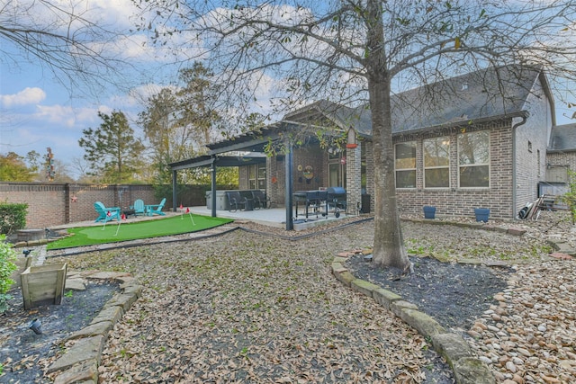 view of yard with a pergola and a patio area