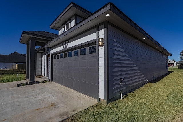 garage with a yard