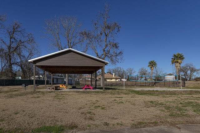 view of yard featuring volleyball court