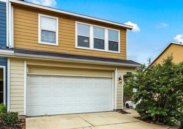 garage with driveway