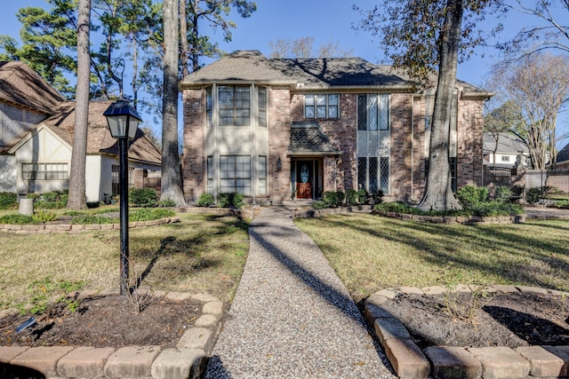 view of front of property with a front lawn