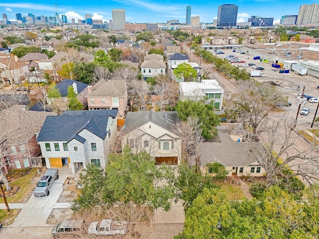 birds eye view of property featuring a view of city