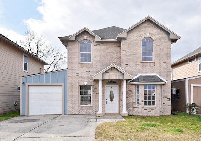 front of property with a garage and a front yard