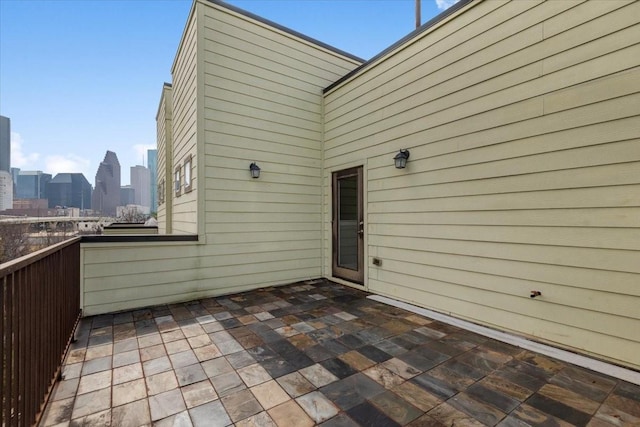 view of patio / terrace with a balcony