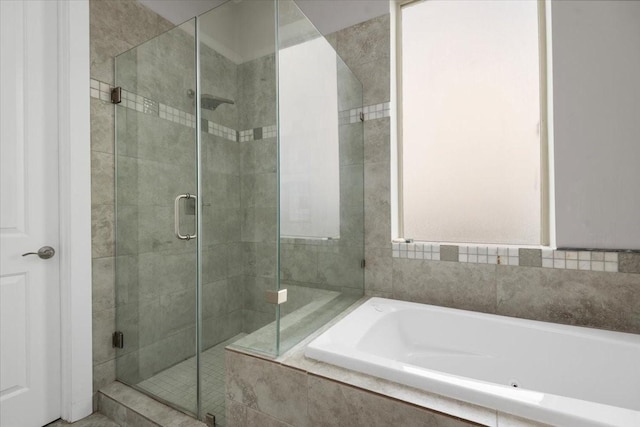 bathroom with independent shower and bath