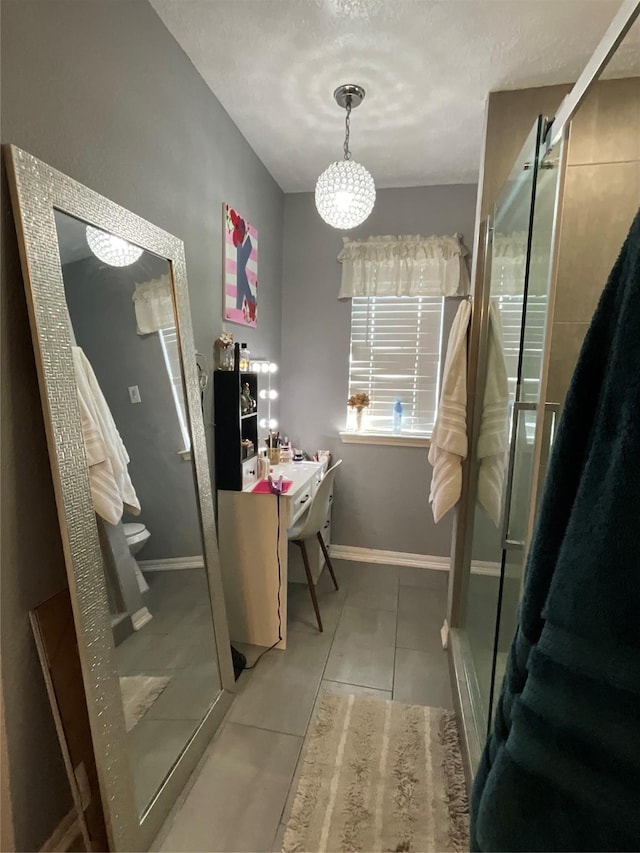 bathroom with tile patterned flooring