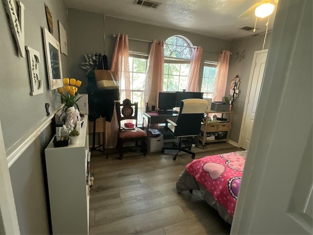 bedroom featuring light hardwood / wood-style flooring