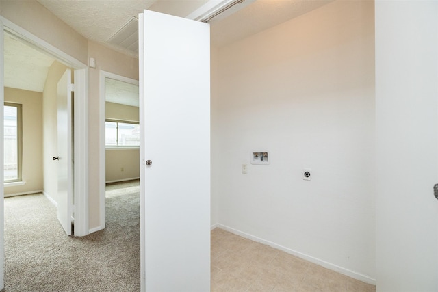 laundry room with light carpet, hookup for a washing machine, and hookup for an electric dryer