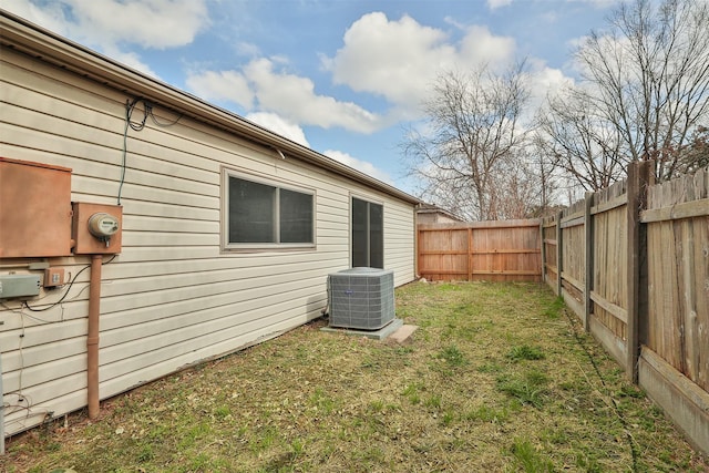 view of yard with central AC