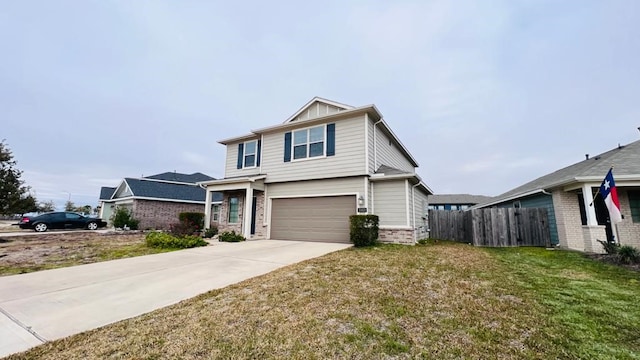 view of front of property with a garage and a front yard