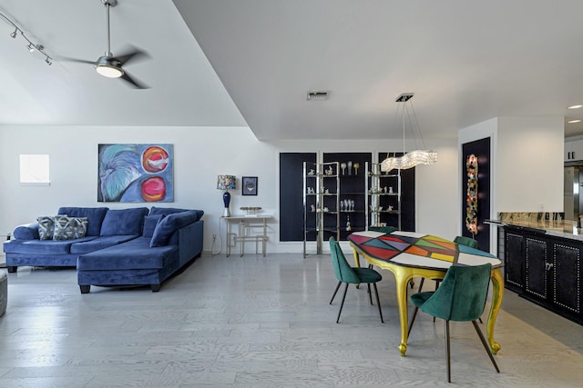 dining room with ceiling fan