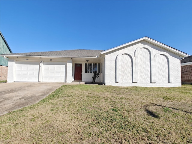 ranch-style home with a garage and a front yard