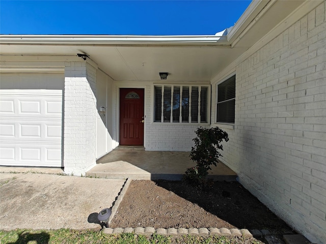 entrance to property with a garage