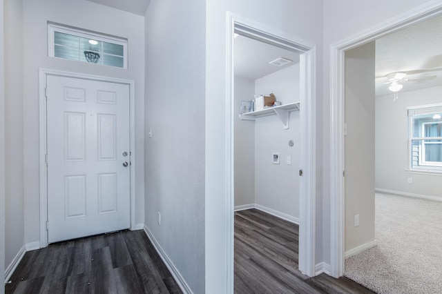 interior space with dark wood-type flooring and baseboards