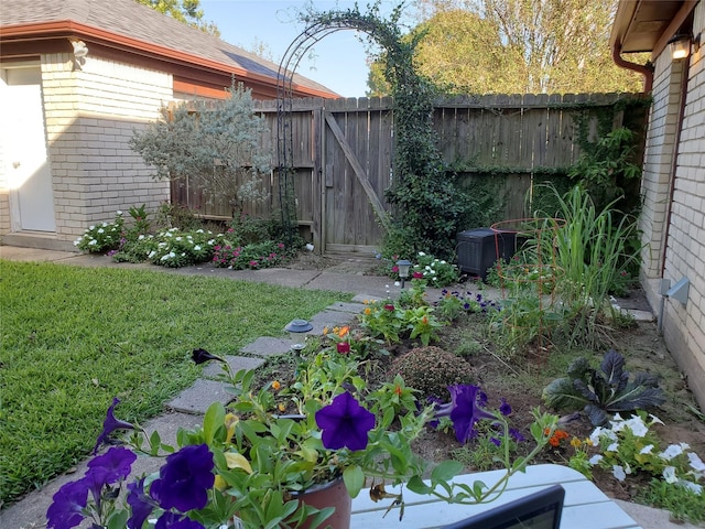 view of yard featuring a gate and fence