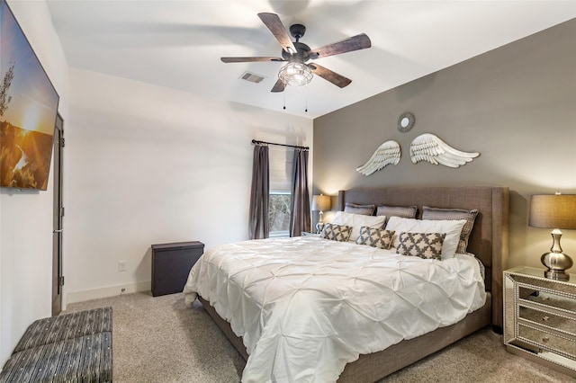 bedroom with ceiling fan and carpet flooring