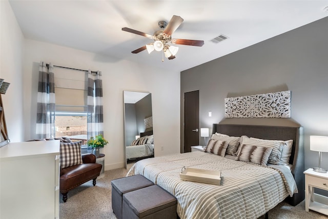 bedroom with light colored carpet and ceiling fan