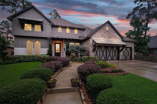 view of front of house with a yard