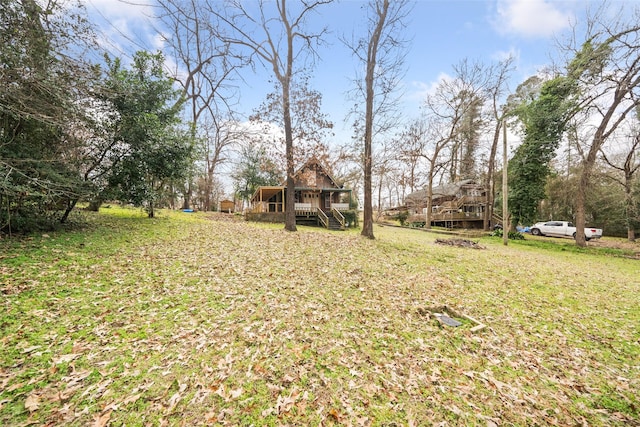 view of yard featuring a deck