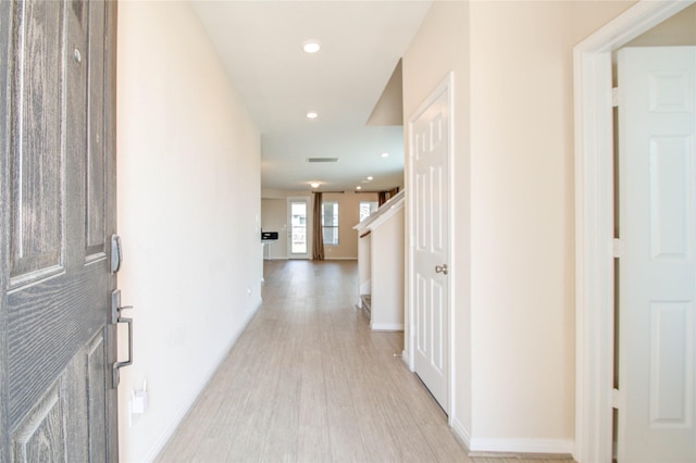 corridor featuring light wood-type flooring