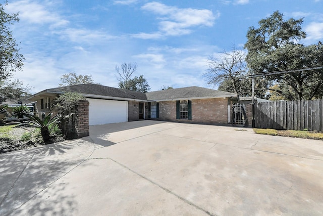 single story home with a garage