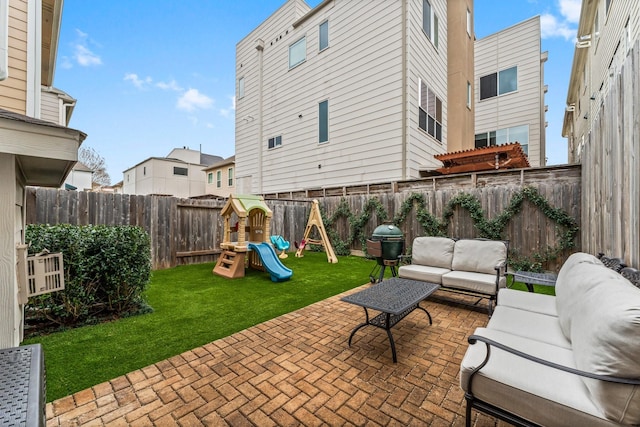 view of patio / terrace featuring outdoor lounge area and a playground