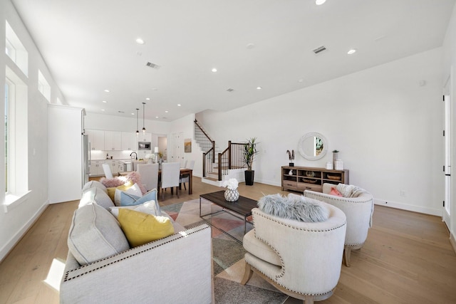 living room featuring light wood-type flooring