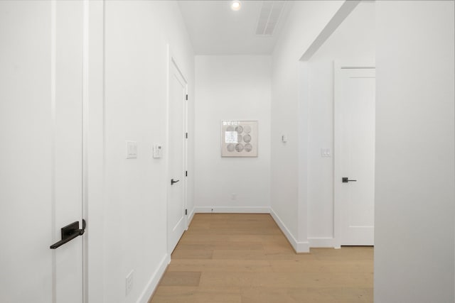 hall featuring light hardwood / wood-style floors