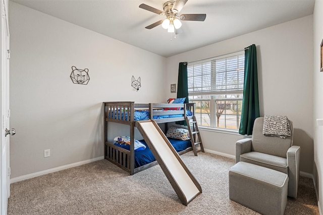 bedroom featuring baseboards, carpet floors, and ceiling fan