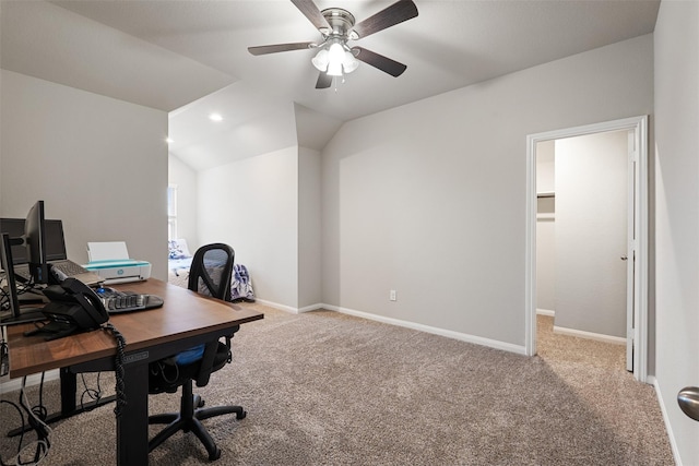 carpeted office space with recessed lighting, a ceiling fan, baseboards, and vaulted ceiling