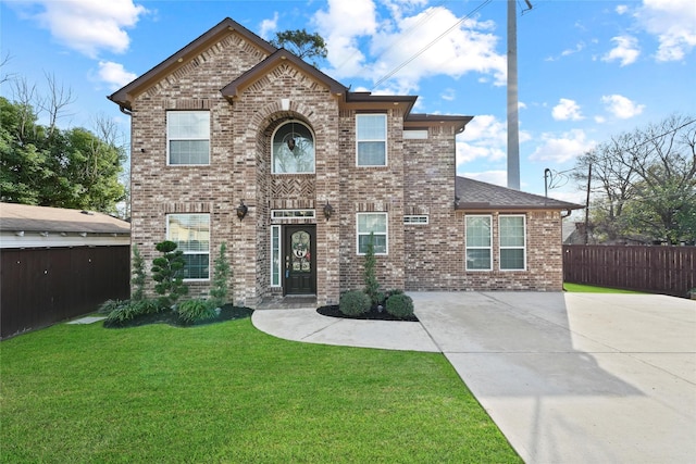 view of front of property with a front lawn