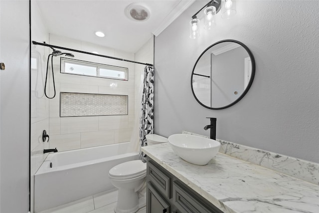 full bathroom with vanity, shower / tub combo with curtain, and toilet