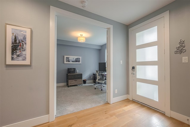 doorway featuring light hardwood / wood-style floors