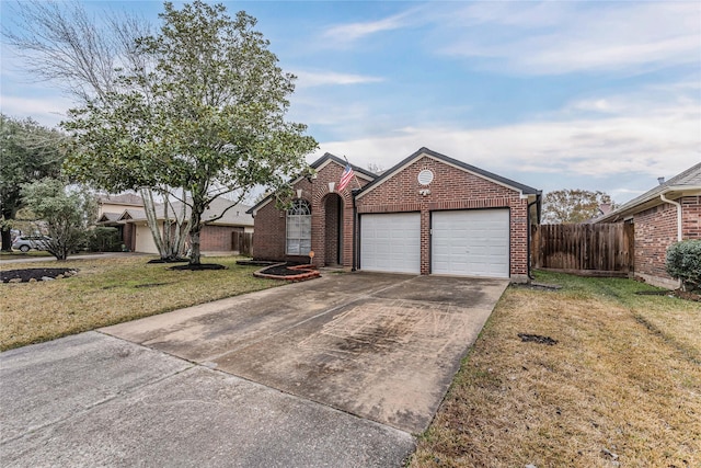 view of front facade with a garage and a front yard