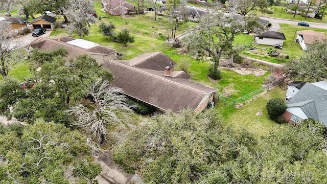 birds eye view of property with a residential view