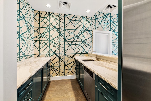 interior space featuring vanity and hardwood / wood-style floors