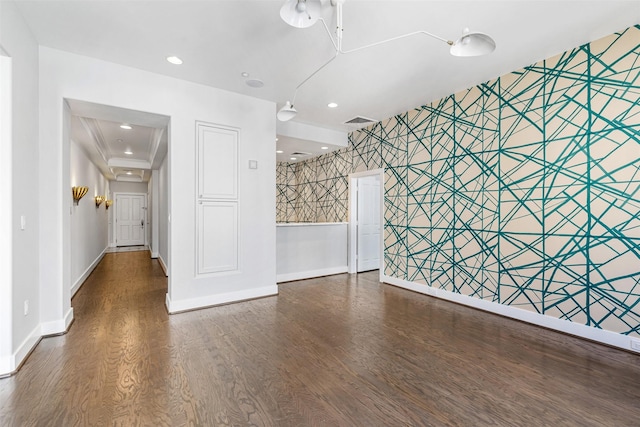 empty room featuring dark hardwood / wood-style flooring