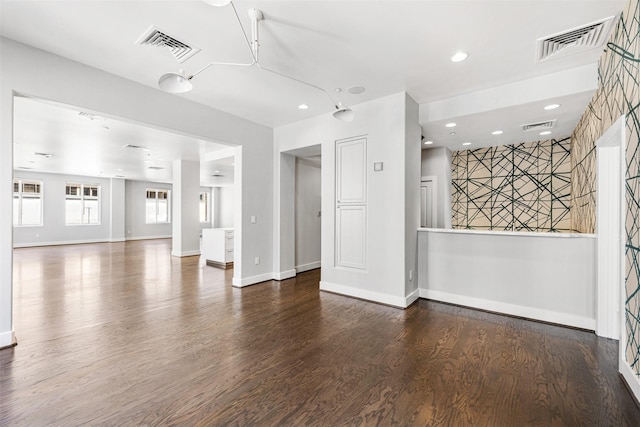 unfurnished living room with hardwood / wood-style floors