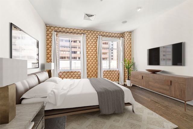 bedroom featuring hardwood / wood-style floors